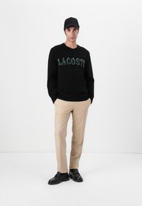 Lacoste Džemperis - black/green