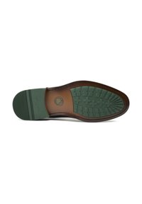 Brown leather shoe sole with a green rubber bottom. Features a textured pattern for grip and branding in the center. Smooth finish.