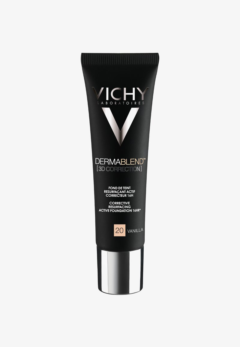 Black tube with glossy silver base and pump. Label features "VICHY," "DERMABLEND," and shade "20 VANILLA" in white and rose gold text.