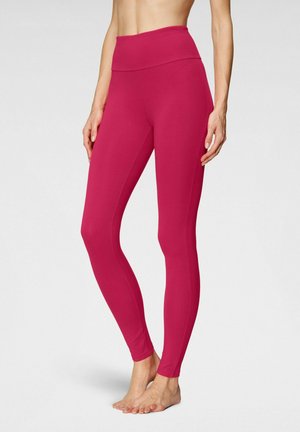High-waisted, form-fitting leggings in bright pink fabric; smooth texture, seamless design, tailored fit, and no visible hardware.