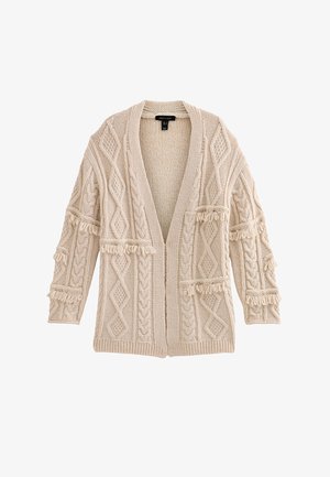 Beige gebreid vest met open voorkant, voorzien van textuurpatronen en franjes op de mouwen en zakken. Lange, losse pasvorm.