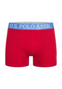 Red cotton boxer shorts with a light blue elastic waistband featuring "U.S. POLO ASSN." logo and a small blue embroidered logo on the leg.