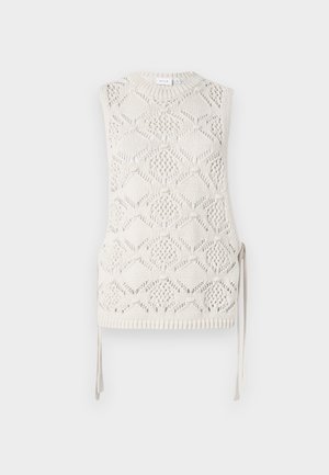 Knit sleeveless top in off-white with a diamond pattern, textured surface, and side ties. Round neckline and ribbed hem detail.