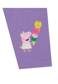 T-shirt en coton violet avec un personnage tenant des cornets de glace colorés, des accents en pointillés sur la robe et une couronne de fleurs.