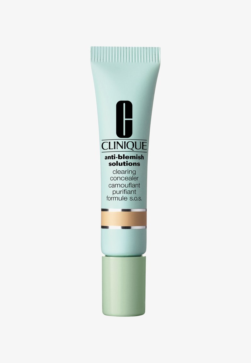 Clinique anti-blemish solutions clearing concealer i en myntgrønn tube med sølvakenter og en grønn bunn; tekst er tydelig vist.