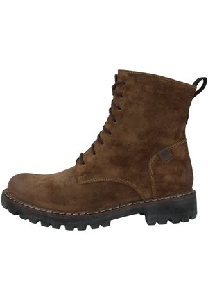 Brown suede ankle boot with lace-up front, rubber sole, and stitched detailing. Features a pull tab at the heel for easy wear.