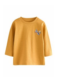 Senfgelbe Langarmshirt mit Rundhals. Aufdruck: ein Flugzeug mit einem Bären, aus weichem, strukturiertem Baumwollstoff gefertigt.