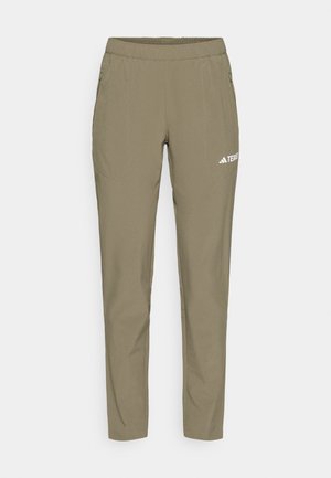 Pantalones ligeros de color verde oliva con cintura elástica, dos bolsillos laterales y el logo blanco "TERREX" impreso en el lado izquierdo.