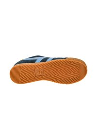 Sneaker sole in orange rubber with herringbone pattern; blue and dark green upper with three stripes design; smooth textured finish.