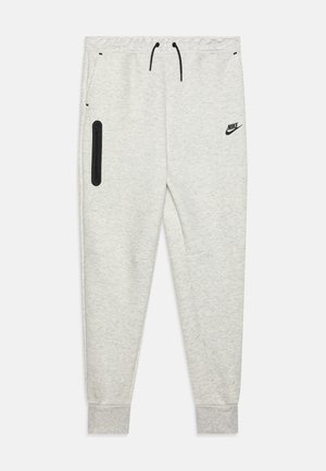Light gray sweatpants with elastic waistband, black drawstring, side pockets, and a zipper pocket. Features black logo on upper left side.