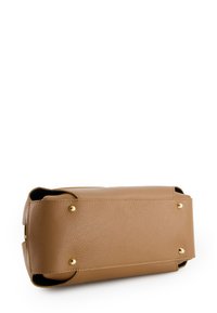 Tan leather handbag with a textured finish, featuring gold-tone hardware accents and a rectangular shape. Bottom has four protective studs.