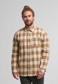 Braun- und cremefarbener karierter Flanellhemd mit Knopfkragen, langen Ärmeln und einer Brusttasche. Hat eine weiche Textur und eine Knopfleiste vorne.