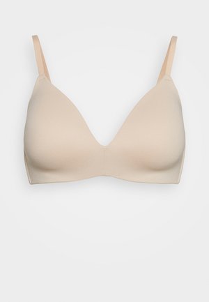 Beige bra with a smooth texture, triangle cups, and thin, adjustable straps. Simple design, no visible hardware or patterns.