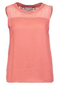 Ärmlös topp i korall med en spetspanel och texturerad detalj längs halsringningen. Slätt tyg med en avslappnad passform och rundad nederkant.