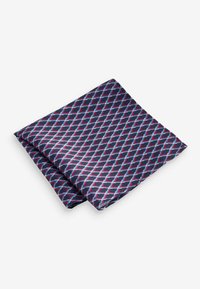 Silk pocket square in navy, featuring a diamond pattern in red and light blue, smooth texture, folded with crisp edges.