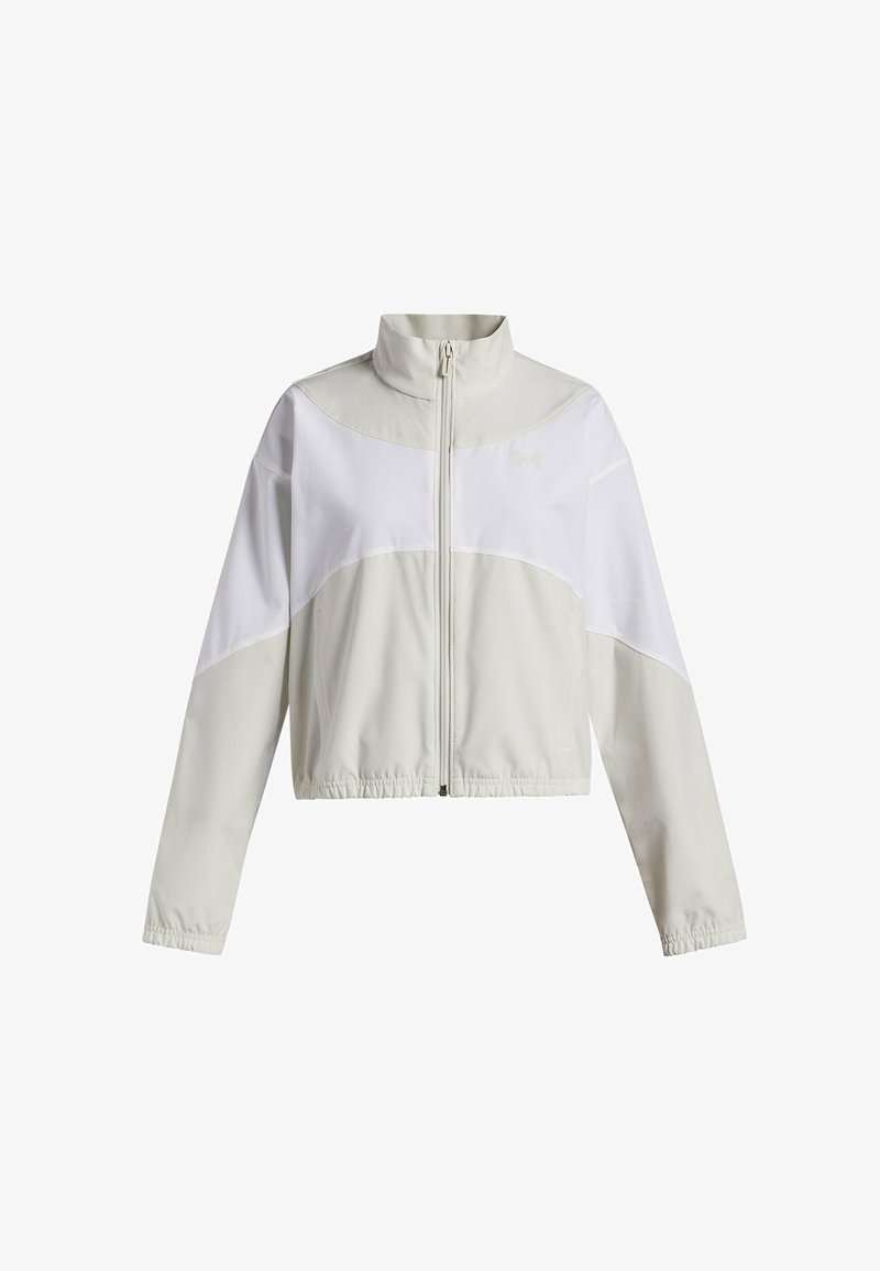 Viegls, īss žakets bēšā un baltā krāsā, ar augstu apkakli, pilnu rāvējslēdzēju, elastīgām piedurknēm un mīkstu, gludu tekstūru.