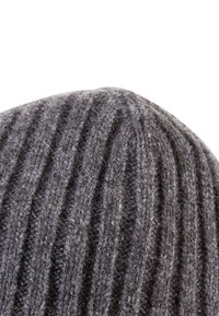 Dark gray ribbed knit fabric with soft, fuzzy texture, shown in close-up with clear vertical stitch pattern.