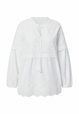 Blusa blanca de manga larga con bordado de ojales, dobladillo en forma de encaje, cuello con volantes y lazo frontal con borlas, de corte holgado.