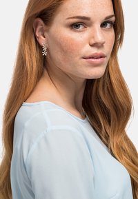 Heideman Náušnice - goldfarbend