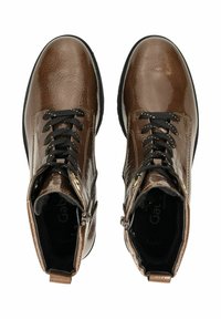 Braune Lederstiefeletten mit glänzender Oberfläche, schwarzen Schnürsenkeln und seitlichem Reißverschluss. Mit runder Zehenpartie und strukturiertem Obermaterial.