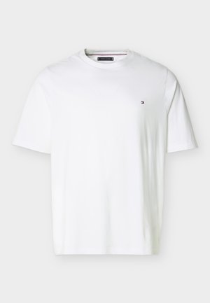 White short-sleeve crew neck T-shirt with small Tommy Hilfiger logo on left chest, displayed on plain light background.