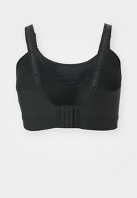 Sujetador deportivo negro con una tela suave y elástica. Presenta tirantes ajustables y un cierre de gancho y ojal en la parte trasera para un ajuste seguro.