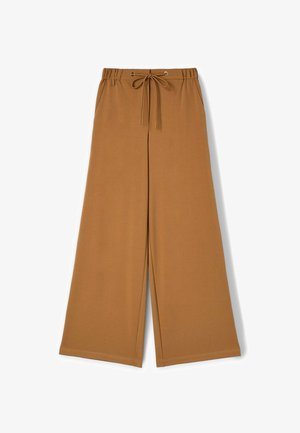 Pantaloni largi de culoare cămilă, cu talie elastică și sistem de închidere cu șnur, buzunare frontale și tiv drept.