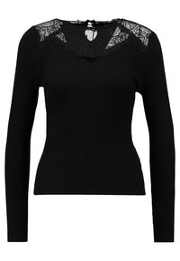 Černý žebrovaný top s dlouhými rukávy, který má krajkový panel kolem výstřihu a vzadu otvor ve tvaru klíče, poskytující texturovaný vzhled.