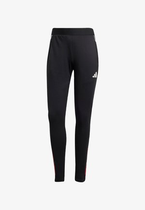 Zwarte sportleggingen gemaakt van elastisch materiaal; voorzien van zijzakken, een effen kleur en een klein wit logo aan de linkerkant.