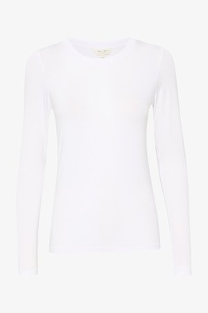 Valge pika varrukaga T-särk, mis on valmistatud siledast kangast. Omab ümarat kaelust ja vormikäiku. Ilma nähtavate mustrite või aktsentideta.