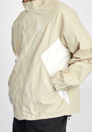 Veste de survêtement - beige
