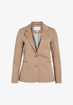 Tan värvi bleiser, millel on kohandatud lõige, kaks esimest nuppu ja küljetaskud. Sees on triibuline vooder. Sile tekstuur, nõgused kraed.