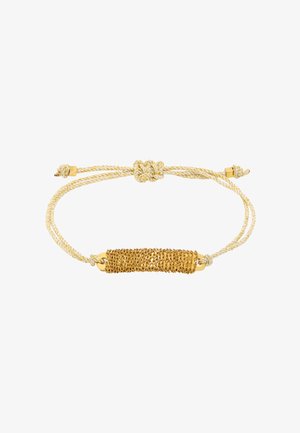Bransoletka w złotym odcieniu z plecionym wzorem sznurka. W środku znajduje się teksturowany złoty łańcuch. Regulowane zapięcie ze złotymi akcentami.