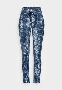 Navy pants with a patterned white design, featuring a drawstring waist, fitted legs, and a smooth fabric texture.