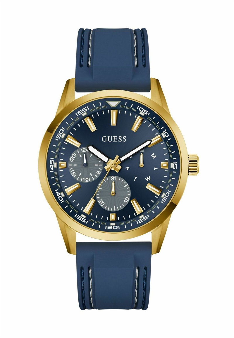Goldfarbener Uhr mit einem navyblauen Silikonarmband. Verfügt über ein dunkelblaues Zifferblatt, silberne Akzente und Unterzifferblätter zur Anzeige von Tag und Datum.