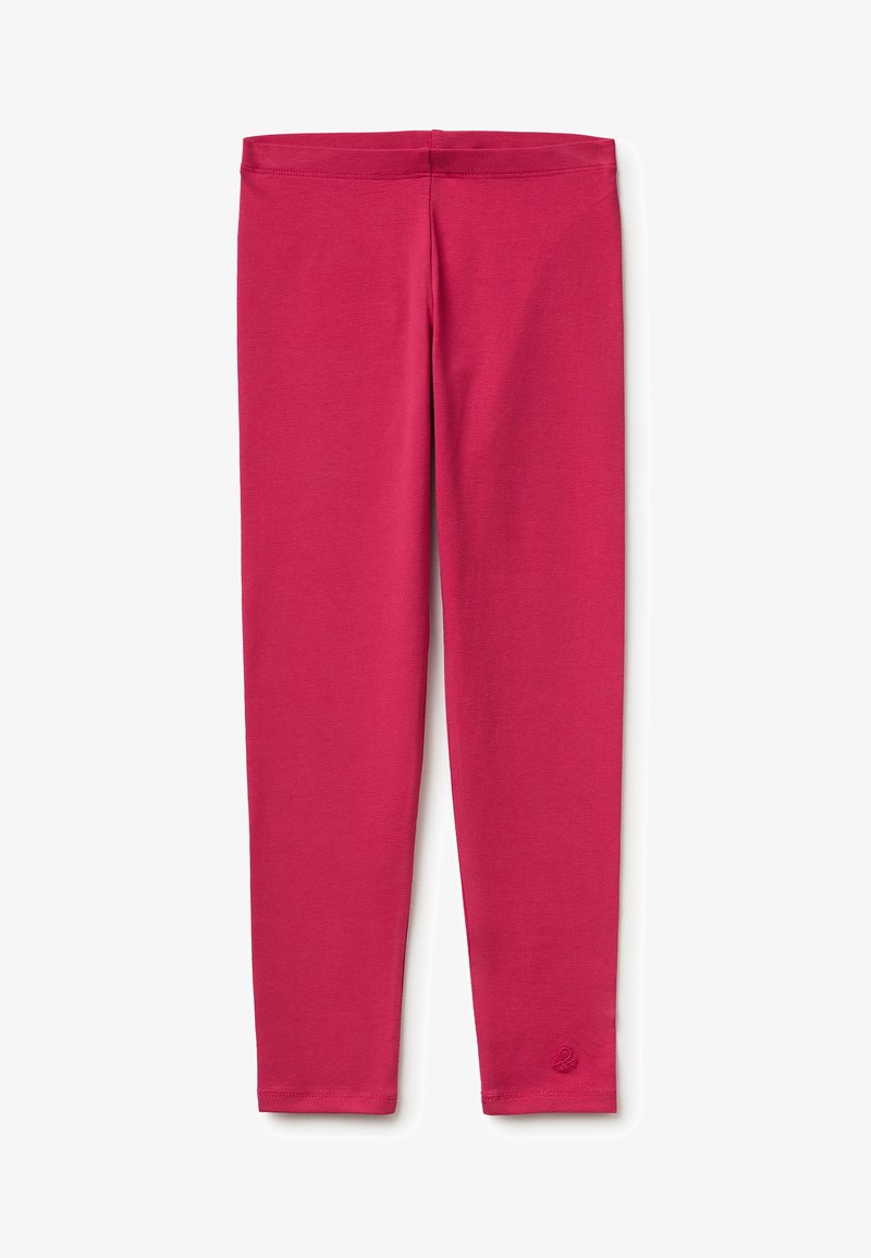 Leggings unis rose vif longueur intégrale avec taille élastique et petit logo brodé près de la cheville gauche.