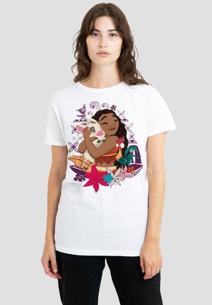 White cotton t-shirt featuring a colorful graphic of a girl hugging a pig, surrounded by tropical flowers and patterns.