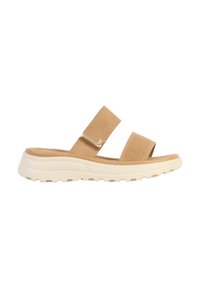 Sandale beige à enfiler avec deux larges brides, semelle intérieure rembourrée et semelle épaisse blanche texturée pour un usage décontracté.