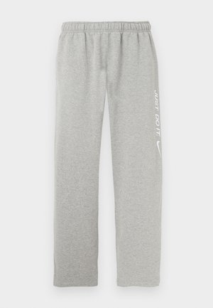 Gray sweatpants made of soft material with an elastic waistband. Features a white "JUST DO IT" text and Nike swoosh logo on one leg.