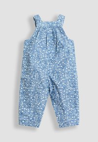 Monos de flores azules con tirantes, con pliegues en el escote y piernas rectas. Hecho de tela ligera.