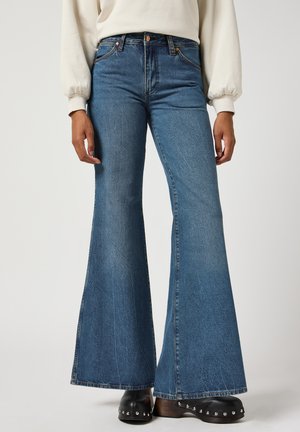 WANDERER - Bootcut jeans - rust tint
