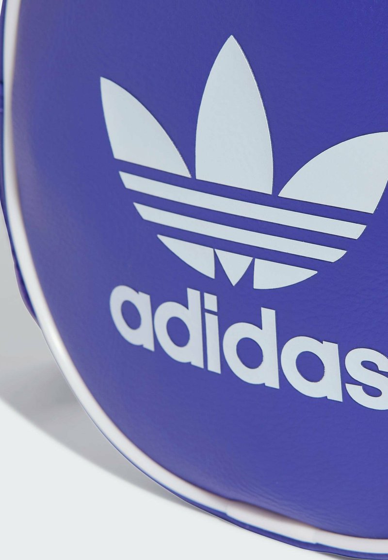adidas Originals ADICOLOR CLASSIC ROUND - Umhängetasche - energy 