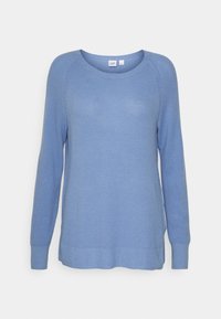 Pull bleu clair en maille avec manches longues, col rond et motif texturé. Comprend un ourlet côtelé et des fentes latérales pour un confort accru.