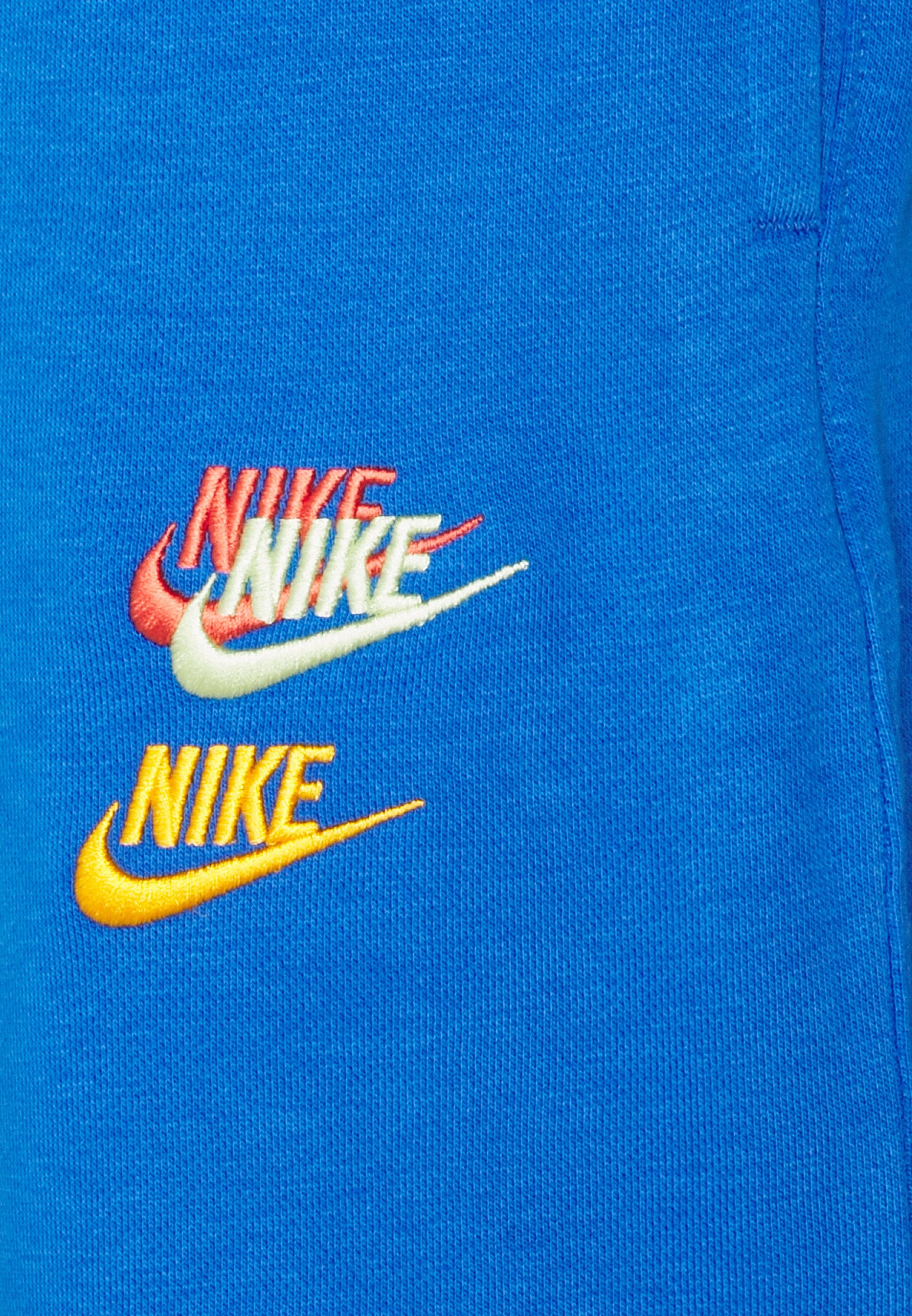 Nike Sportswear Tracksuit bottoms - signal blue/blue - Zalando.de
