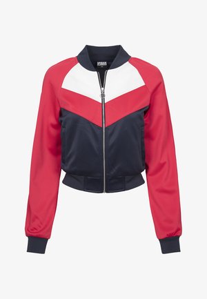 Cropped bomber jacket featuring red, navy, and white panels, glossy texture, ribbed cuffs, and a front zipper closure for easy wear.