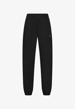 Sorte sweatpants med elastisk talje og manchetter, med diskret logo på øverste lår, lavet af blødt stof til afslappet brug.