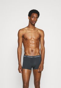 Calvin Klein Underwear LOW RISE TRUNK STRETCH 3 PACK - Cuecas boxer - hemispere blue/black