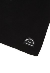 Bonnet en tricot noir avec un patch logo en caoutchouc noir comportant le texte blanc "KARL LAGERFELD PARIS 21 RUE ST-GUILLAUME." Texture douce.