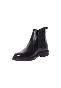 Stivale Chelsea in pelle nera con finitura liscia, pannelli laterali elasticizzati, punta rotonda e suola piatta in gomma, adatto per un uso casual.