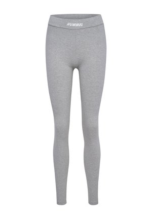 Grijze legging gemaakt van zachte stof, met een hoge tailleband en het "HUMMEL" logo. Strakke pasvorm met een gladde, gelijkmatige textuur.